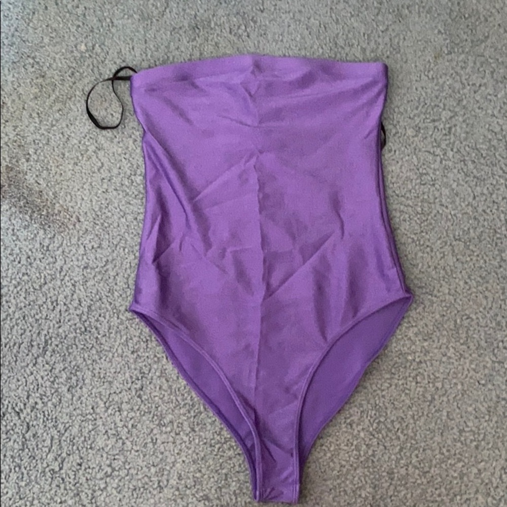 Strapless purple metallic body suit